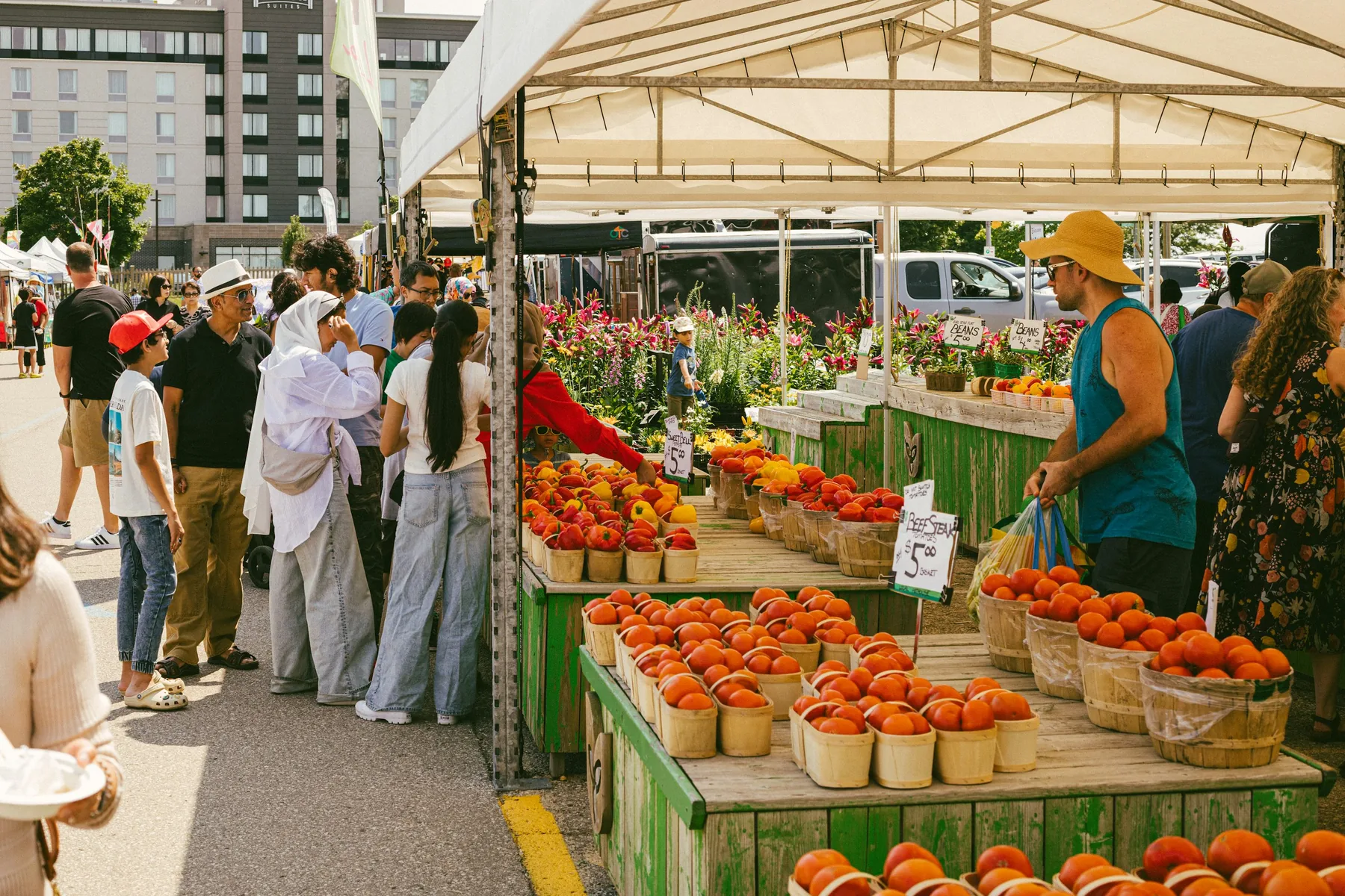 Seasonal fruit and vegetables at a farmers market produce stall